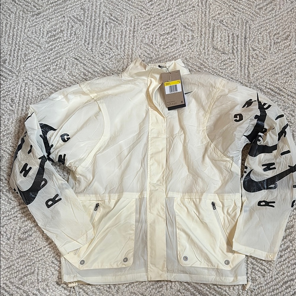 Nike women’s Cream and Black Windbreaker Jacket size Small-new